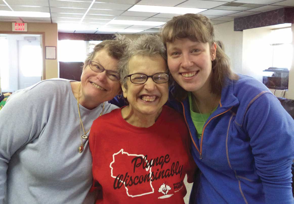 Workers and Patient smiling at Day Center